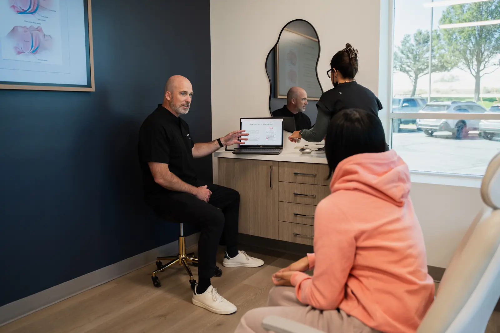 Reviewing a treatment plan with a patient at Toothpillow Breathing and Sleep Center