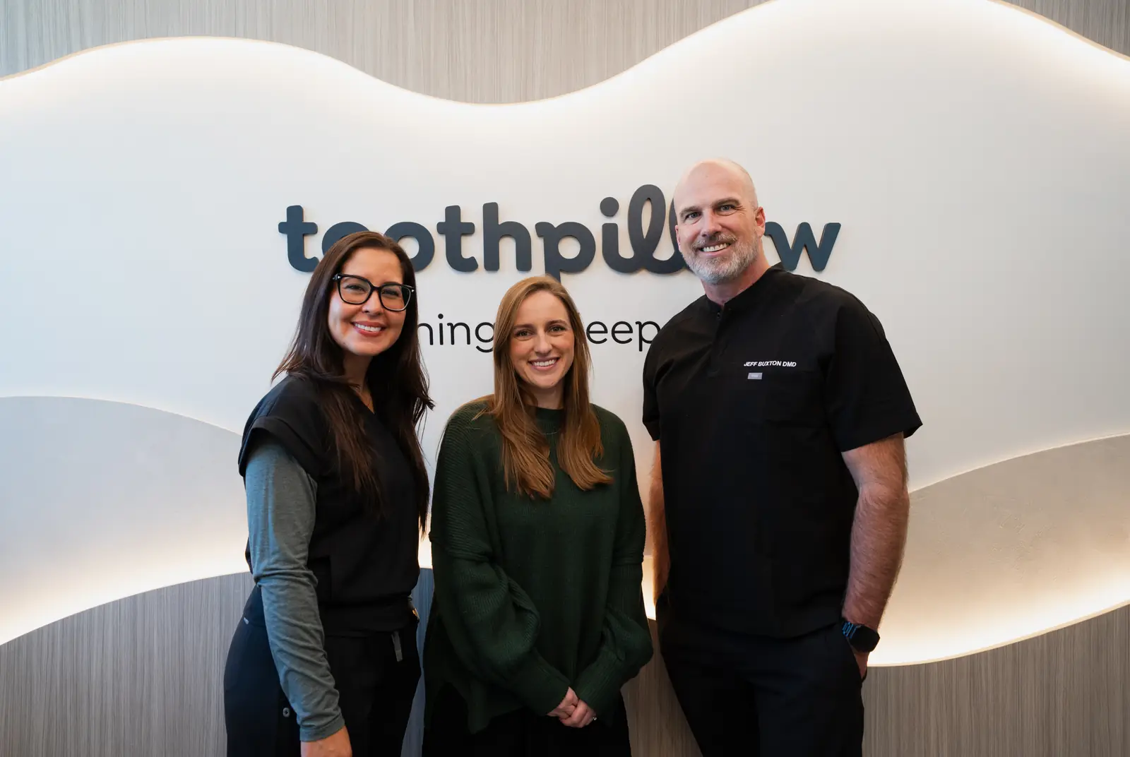 Dr. Jeff Buxton with members of the Toothpillow Breathing and Sleep Center team in Draper, Utah